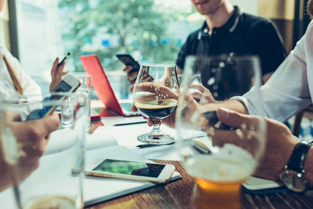People sharing a few drinks at work